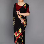 Saree in black pure Georgette with floral print